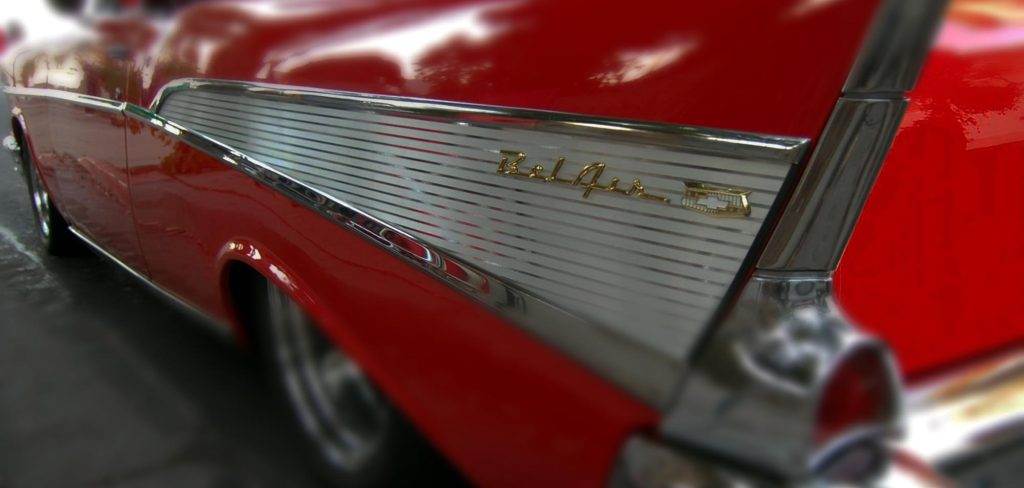 Classic red 1957 Chevy Bel Air tail fin detail. Georgetown KY vintage car show.